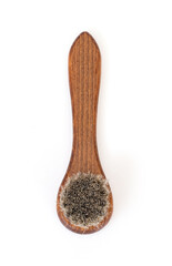 Bristle wooden brush for cleaning clothes and shoes isolated on white background