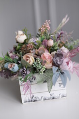 Flowers in box on table