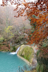 Turquoise water in the source of the Uderra River natural Park Urbasa-Andia, Baquedano, Navarre, Spain, Europe.