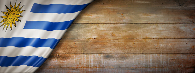 Uruguaian flag on vintage wood wall banner