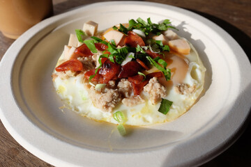 Indochina pan-fried egg with toppings is homemade Thai style and easy breakfast in the morning