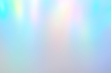 Iridescent holographic abstract aurora light neon colors background. Blurred pastel multicolored...