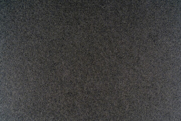 Abstract gray background. White dots on a black background.