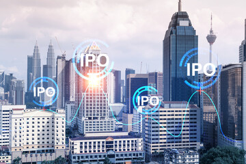 IPO icon hologram over panorama city view of Kuala Lumpur. KL is the hub of initial public offering...