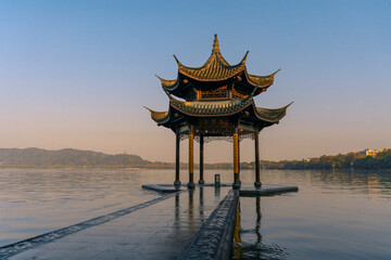 Obraz premium Jixian pavilion, the historic landmark at West Lake in Hangzhou, China.