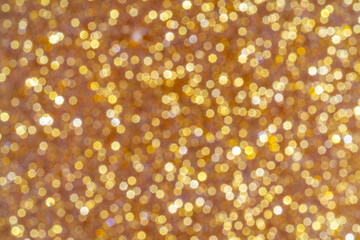 Abstract golden background. Beautiful bokeh effect. Light circles background.