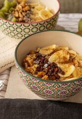 Close up of a two porridge bowls.