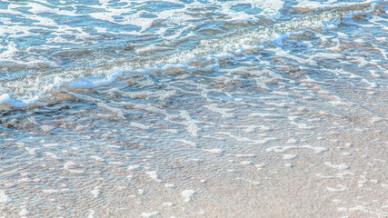 crystal clear azure water with sea foam, seascape background