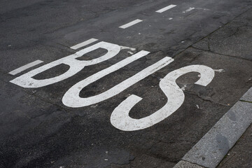 Closeup of bus sign painted on the road