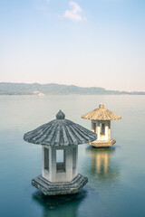 Fototapeta premium Cuiguang pavilion, the historic landmark in West Lake, in Hangzhou, China.