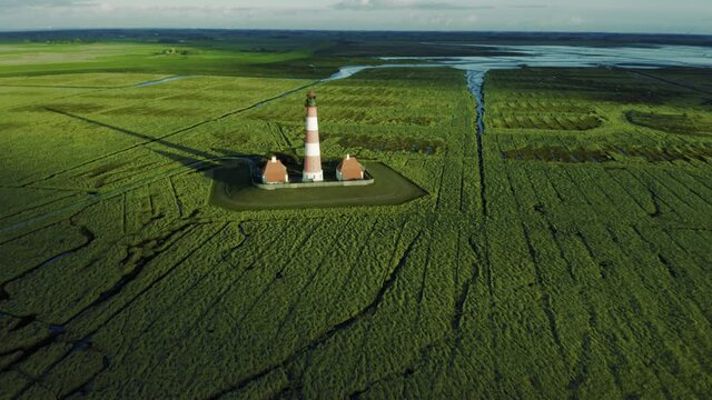 Lighthouse Westerheversand, Germany. Schleswig-Holstein, North Sea. 4K drone.