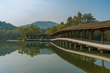 Chinese pavilion at the West lake in Hangzhou, China, autumn time.