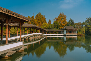 Chinese pavilion at the West lake in Hangzhou, China, autumn time.
