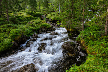 Fototapeta premium Waterfall with variations and a river