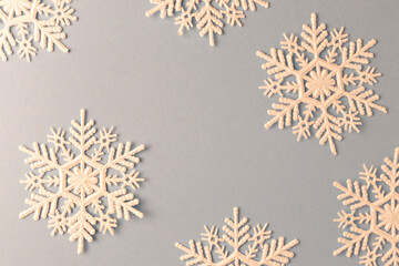 Snowflakes for New Year's decor on a blue background with space for text. Christmas layout.