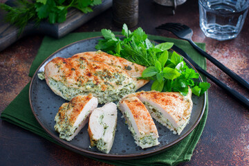 Baked chicken breast stuffed with cheese and spinach, horizontal