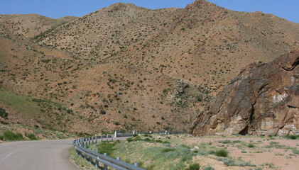 Road to the mountains in Inner Mongolia. Consept of traveling, way, road trip