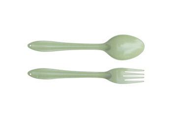 Metal spoon and fork light green isolated on white background clipping path.