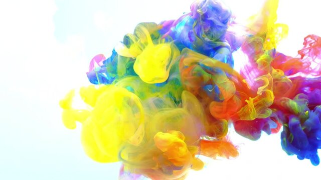 4K Footage,Color splash background, Color paint drops in water , Luxury colors Slow motion shot,