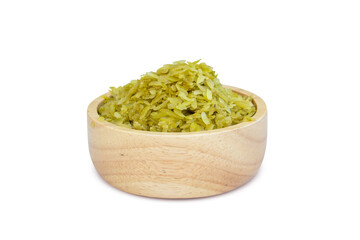 Green rice grain full of vitamins. For making Thai desserts in wooden cups on a white background clipping path. (Khao Mao) Thai dessert caused by Folk wisdom 