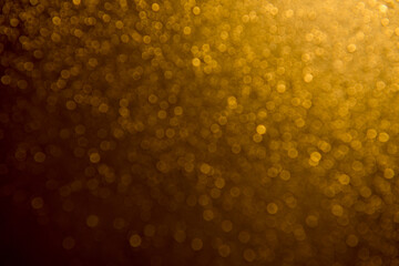Gold bokeh with black background