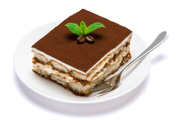 Traditional Italian Tiramisu square dessert portion on ceramic plate isolated on white background with clipping path