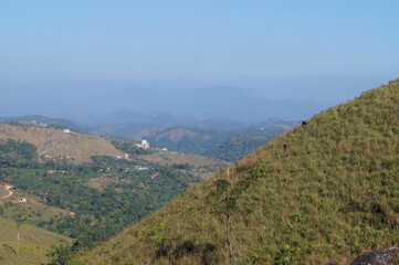 Fototapeta premium Top of a hill with full of grass in vagamon, Kerala, India
