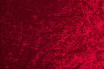 red velvet fabric, abstract background. Soft texture cloth. close-up.