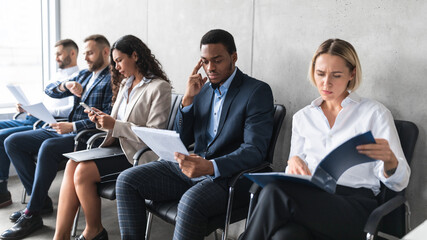 Diverse Unemployed Business People Applicants Waiting For Job Interview Indoor