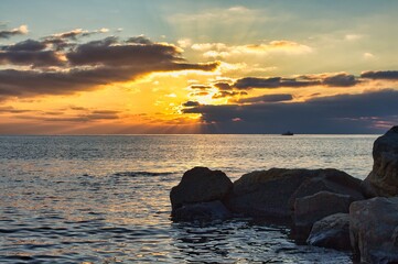 Fototapeta na wymiar Wonderful sea in the rays of the setting sun.