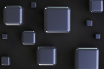 Black polished cubes in various sizes. Top view. Abstract backdrop.