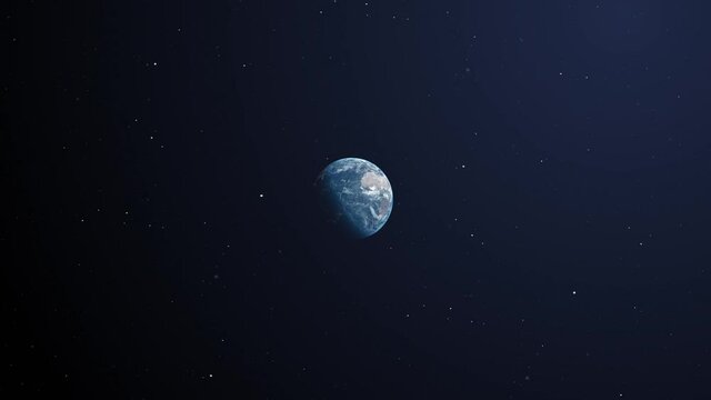 Distant view of planet earth surrounded by the dark blue space and some stars. Day time in the east