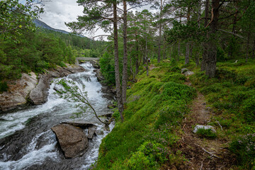 Huge waterfall with its river