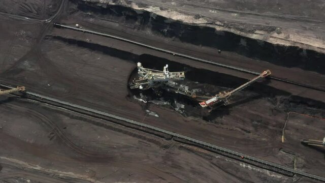Rotation around of a mining quarry of coal or natural raw material. Bucket wheel excavator