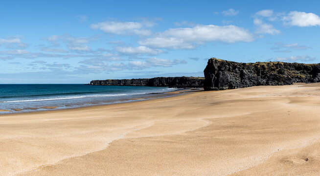 Skar&eth;sv&iacute;k, Skardsvik sandy beach (Hellissandur) in west iceland on a sunny spring day