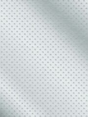 丸い窪みがあるパンチングメタルの背景素材