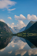 Reflection from the mountains in a fjord