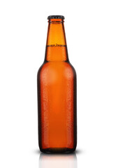 brown bottle with beer in drops
