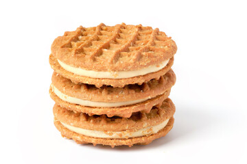 Stack of peanut butter cream cookies isolated on white