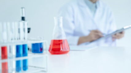 Technical scientist experiment analyzing medical solution at lab..