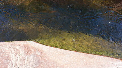water flowing into the river