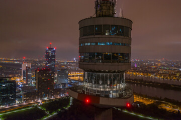 Beautiful drone shot of viennas danube tower at night