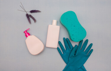Gloved hand. Hand washing products. The concept of cleaning. the view from the top. Make it easier to clean the house. Detergents on a white background