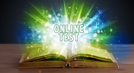 ONLINE TEST inscription coming out from an open book, educational concept