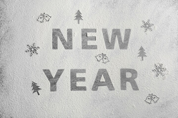 Different drawings and words New Year made of flour on grey table, top view