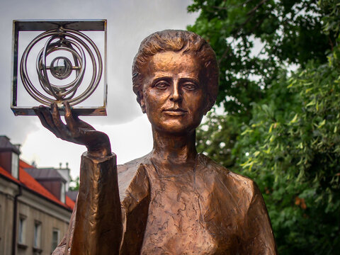 WARSAW, POLAND - JULY 25, 2017 Bronze monument to Marie Sklodowska-Curie close-up