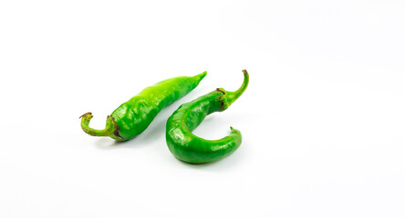 Two green peppers on white isolated background unique photo banner