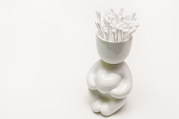 capacity for cotton sticks on white background