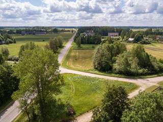 countryside aerial landscape with roads and green fields in summer