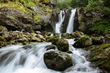 Double waterfall in a forest